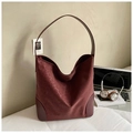 Macro shot of deep burgundy suede hobo bag with smooth leather corner details for commute - Leopard Print Wine Red
