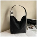 Minimalist black oversized suede tote bag shown in a daily lifestyle office setting - Black
