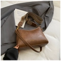 Retro dark brown bucket bag featuring a textured woven shoulder strap and matte finish - Brown No Pendant