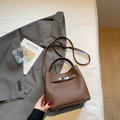 Vintage brown leather bucket bag with litchi grain texture and silver metal lock - Coffee without Pendant