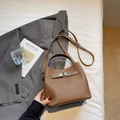 Brown lychee leather bucket bag with silver metal buckle and adjustable long strap - Brown No Pendant