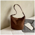 Deep brown matte suede bucket bag with adjustable leather strap and minimalist design - Coffee without Pendant
