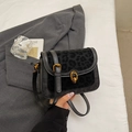 Minimalist black crossbody bag with leopard print flap and vintage metal buckle - Black