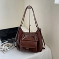 Vintage brown leather backpack for women with contrast stitching and shoulder strap - No Pendant / Brown