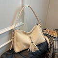 Elegante borsa tote in velluto a coste beige con strisce testurizzate e nappa decorativa - Bianco Sporco
