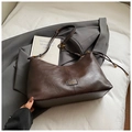 Detail of a dark brown PU leather tote bag with metallic logo and adjustable strap - Coffee without Pendant