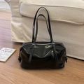 Close-up of black glossy shoulder bag with silver adjustable buckles on wood floor - No Pendant / Black