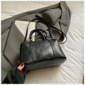 Classic black Boston handbag in retro textured leather with elegant gold hardware accents - Black without Pendant