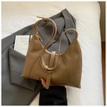 Detail view of earthy brown hobo bag with matte leather texture and sleek metal zipper - Khaki