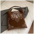 Ricami dettagliati su una borsa tote vintage in pelle scamosciata marrone scuro - Marrone