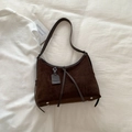 Retro dark brown faux suede shoulder bag with tassel detail and vintage leather strap - Brown