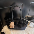 Elegant black faux fur tote bag featuring a cute brown puppy plush charm and gold buckle - With Charm / Black