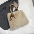 Chic beige faux fur tote bag with brown woven handles and cute monster charm detail - With Pendant / Off White
