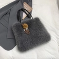 Chic grey faux fur tote bag with black woven handles and leopard print charm accessory - With Pendant / Gray