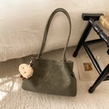 Detail of olive green suede tote bag with long straps and cute plush animal charm accessory - With Pendant / Green