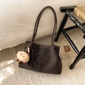 Detail of dark brown suede tote bag with plush lamb charm and contrast stitching - With Pendant / Brown