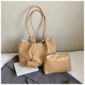 Detailed view of khaki woven tote bag with matching inner pouch and knotted charm accessory - Khaki