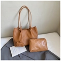 Detailed view of brown woven tote bag 3-piece set with a zipper pouch and coin purse - Brown