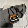 Mini black handbag with white lace trim, cute bear patch, and plush baguette charm detail - Black