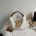 Detail of off-white faux fur tote bag with brown leather handles and removable shoulder strap - Off-white