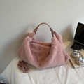 Pink plush handbag detail featuring soft faux fur texture and detachable PU shoulder strap - Pink