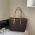 Close-up of large tote bag with NK pattern, double straps, and golden rivets details - Coffee & Khaki