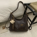 Detail of dark brown faux leather tote bag with small buckle pocket and plush bear charm - Coffee With Pendant