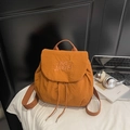 Detail of orange waffle texture backpack with YOU JIBEAR embroidery and drawstring - Brown