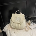 Detail of cream-white drawstring backpack with bubble texture fabric and embroidery - Off-white
