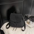 Detail of black drawstring backpack with You Jibear embroidery on the nylon cover - Black