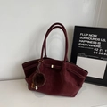 Detail view of maroon faux suede tote bag featuring a plush charm and metal buckle design - With Pendant / Burgundy