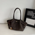 Detail of dark brown faux suede tote bag featuring a plush pom-pom and beaded tassel - With Pendant / Coffee