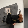 Black matte leather half-moon shoulder bag with golden hardware and plush bear charm - Black With Pendant