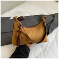 Detail of vintage mustard suede underarm bag with leather trim and decorative tassels - Brown with Pendant