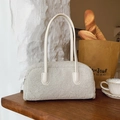 Elegant white faux shearling tote bag with leather handles in cozy cafe setting - White