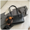 Minimalist black faux leather tote bag with embossed text and cute brown plush charm - Black with Pendant