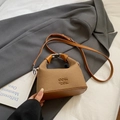 Chic camel canvas and leather crossbody bag with COIH 2DN embossed lettering - Brown