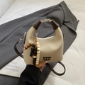 Chic beige canvas handbag with dark brown leather straps and wooden bead tassel accessory - Cream White with Pendant