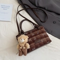 Brown plaid crossbody bag detail with cute plush bear charm and vintage brand label - Brown with Pendant