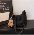 Black large-capacity tote bag in suede texture with dog charm and gold hardware - With Charm / Black