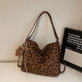 Detail shot of leopard print tote bag with double straps and brown teddy bear charm - With Pendant / Brown