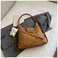 Detail of caramel brown retro PU leather hobo bag with a cute white bear plush charm - Brown with Pendant