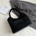 Detail of black suede tote bag with bow tie decoration and debossed branding - Black with Letters
