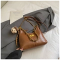 Detail of brown vintage crossbody bag with gold chain strap and cute bear charm - Brown Small With Pendant