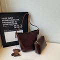 Deep brown retro bucket bag set with inner pouch and adjustable strap on white surface - Coffee