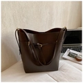 Minimalist deep brown leather bucket bag with gold hardware for office commuting - Brown