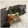 Brown and green plaid plush bucket bag with fuzzy white trim and faux leather handles - With Pendant / Plaid Green