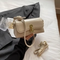 Schicke cremeweiße PU-Leder-Umhängetasche mit goldenem Drehverschluss und Knotengriff - Gebrochenes Weiß