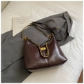 Dark brown high-shine hobo bag with gold square buckle and chain strap on white linen - Large Coffee Without Pendant