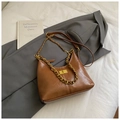 Brown leather dumpling bag with gold chain strap and turn-lock closure in caramel - Small Brown Without Pendant
